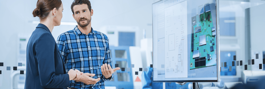2 People Discussing a 125 Ton Lamination Hot Press