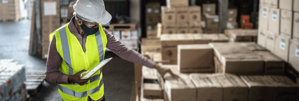 Worker Stacking Boxes