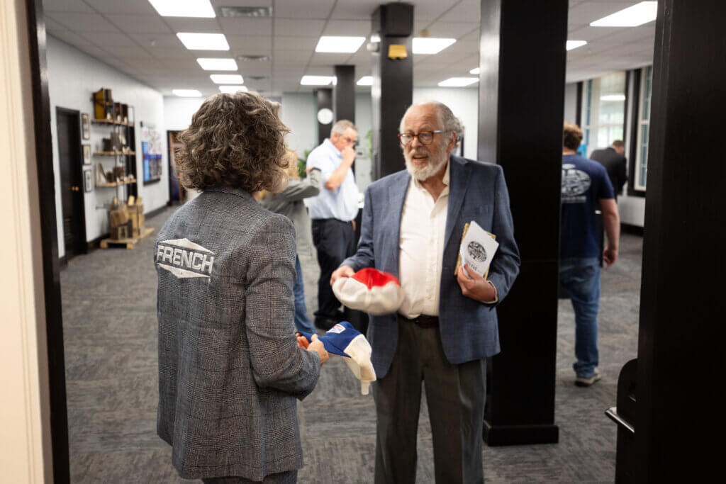 Tayte French Lutz receiving a gift at French Oil.
