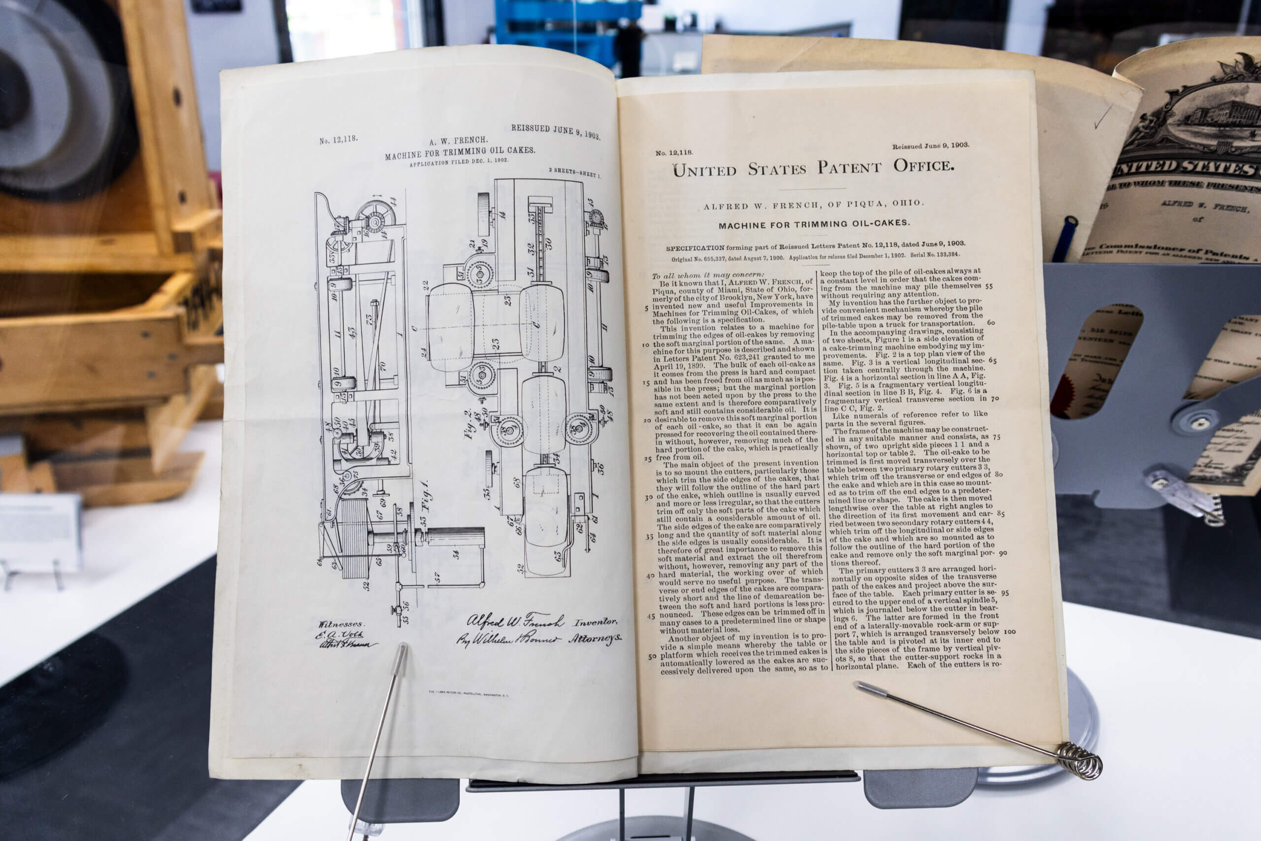 1903 U.S. Reissue Patent Framed 1903 U.S. Reissue Patent No. 12,118, Alfred W. French Sr.'s machine for trimming oil-cakes, in The French Museum.