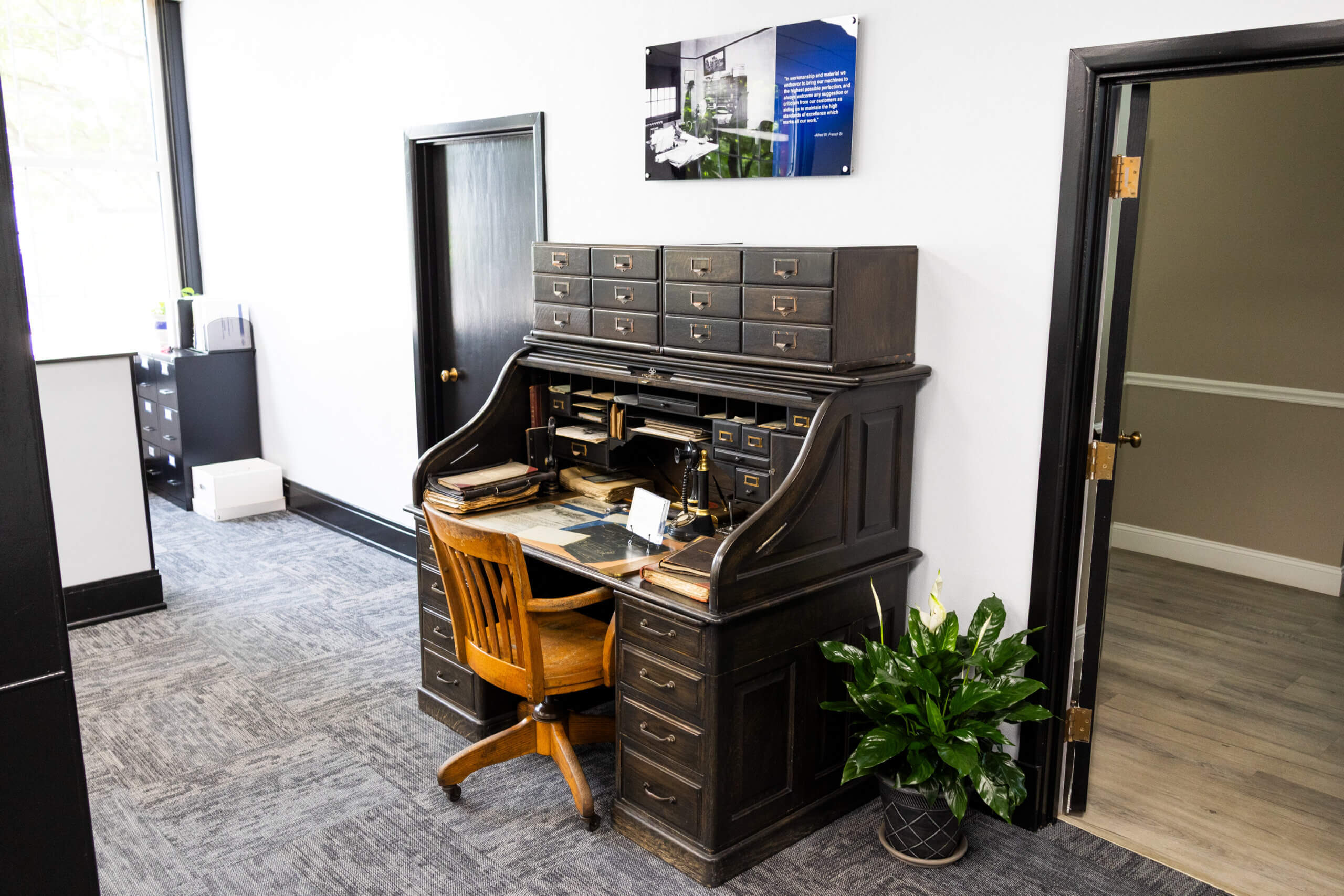 AWF_roll_top_desk Alfred Willard French Sr.'s roll top desk with ledgers, letters, and slide rule, in The French Museum.
