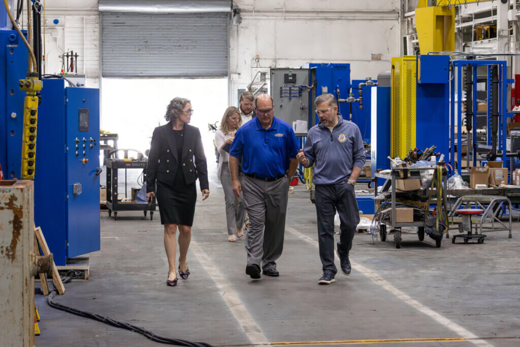 Individuals walking through the French Headquarters